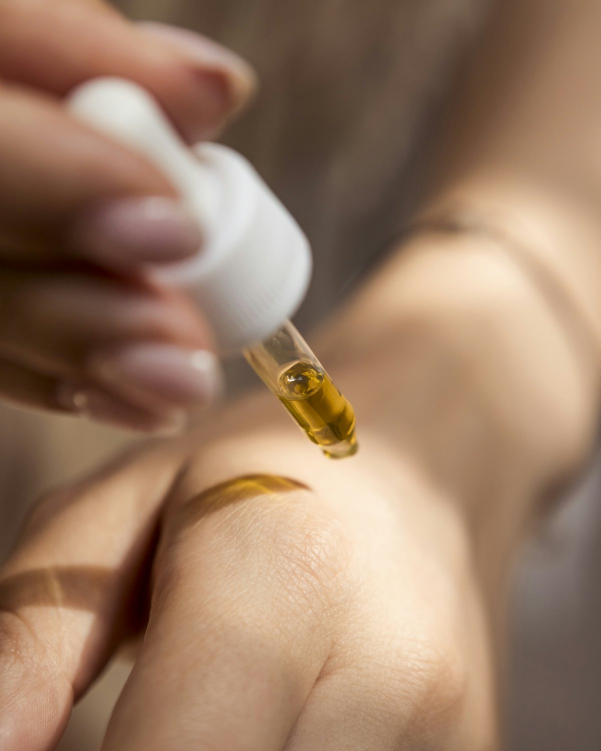 A drop of oil applied to skin